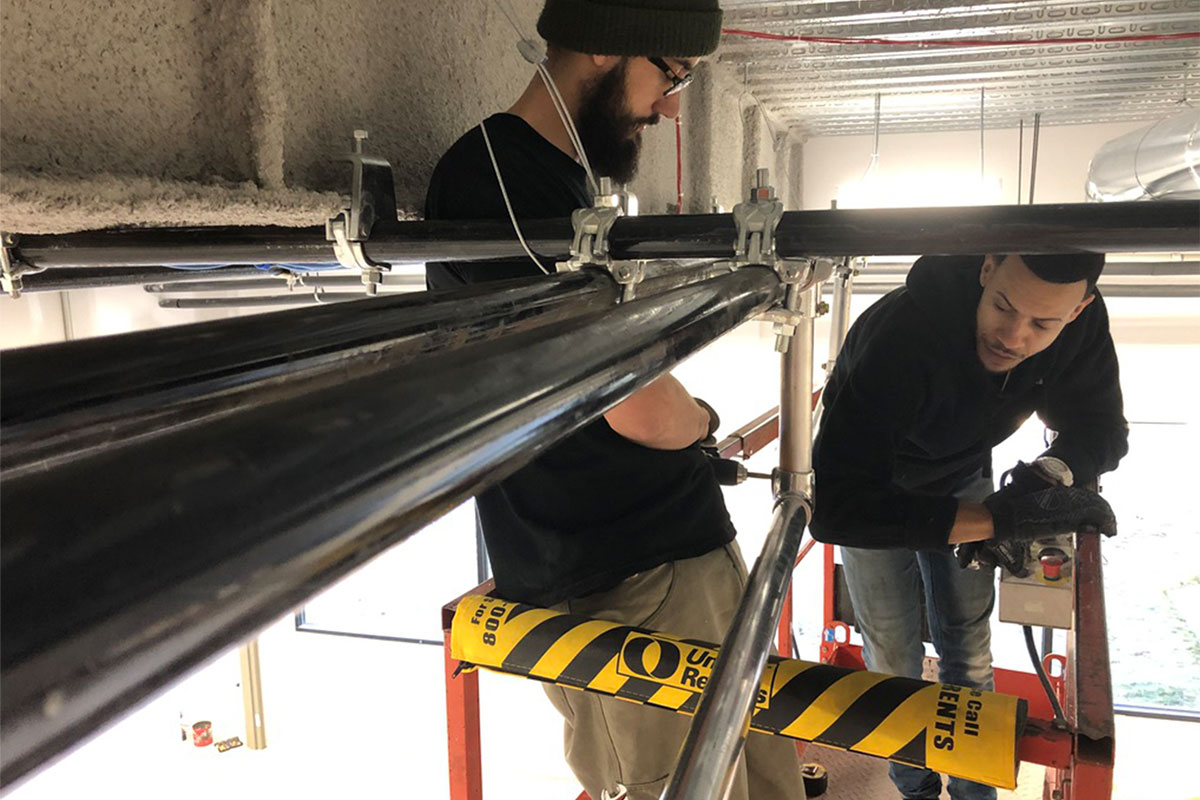 Men Installing Studio Lighting