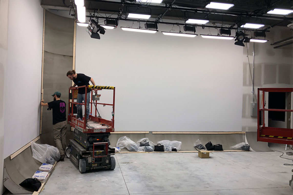 Men Installing Cyclorama